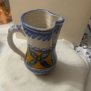 Artisan Ceramic Pitcher with Blue and Yellow Motif